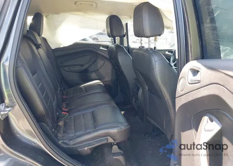 2016 Ford Escape Titanium z USA, uszkodzony, nr VIN 1FMCU9J95GUB57721